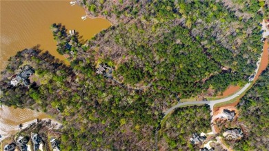 This exclusive +/- 5.43-acre lakefront lot promises privacy and on Reynolds Lake Oconee - The Oconee in Georgia - for sale on GolfHomes.com, golf home, golf lot