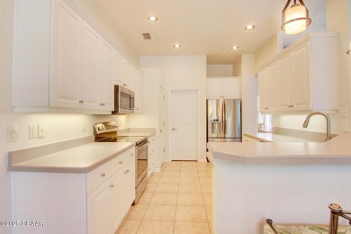 Located on a quiet dead-end street in the guard-gated Spruce on Spruce Creek Golf Club in Florida - for sale on GolfHomes.com, golf home, golf lot