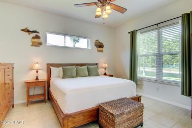 Located on a quiet dead-end street in the guard-gated Spruce on Spruce Creek Golf Club in Florida - for sale on GolfHomes.com, golf home, golf lot