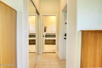 Located on a quiet dead-end street in the guard-gated Spruce on Spruce Creek Golf Club in Florida - for sale on GolfHomes.com, golf home, golf lot
