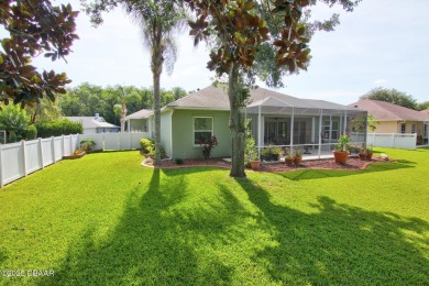 Located on a quiet dead-end street in the guard-gated Spruce on Spruce Creek Golf Club in Florida - for sale on GolfHomes.com, golf home, golf lot