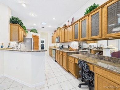 Beautiful Pool Home in Rainbow Springs Country Club Nestled in on Rainbow Springs Golf and Country Club in Florida - for sale on GolfHomes.com, golf home, golf lot