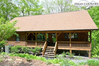 Custom built Rustic Log Home on a quiet wooded lot.  Enjoy this on Mountain Aire Golf Course in North Carolina - for sale on GolfHomes.com, golf home, golf lot