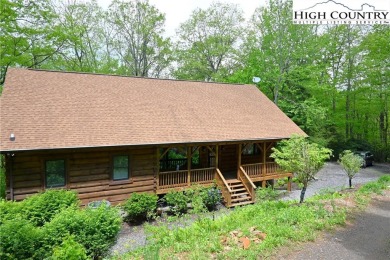 Custom built Rustic Log Home on a quiet wooded lot.  Enjoy this on Mountain Aire Golf Course in North Carolina - for sale on GolfHomes.com, golf home, golf lot