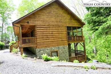 Custom built Rustic Log Home on a quiet wooded lot.  Enjoy this on Mountain Aire Golf Course in North Carolina - for sale on GolfHomes.com, golf home, golf lot