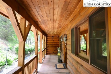 Custom built Rustic Log Home on a quiet wooded lot.  Enjoy this on Mountain Aire Golf Course in North Carolina - for sale on GolfHomes.com, golf home, golf lot