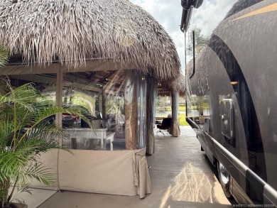 Welcome to paradise! This meticulously maintained, back-in lot on Motorcoach Resort Golf Course in Florida - for sale on GolfHomes.com, golf home, golf lot