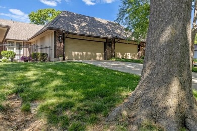 Welcome to this spacious 2-bedroom, 2-bath townhome perfectly on Leawood South Country Club in Kansas - for sale on GolfHomes.com, golf home, golf lot
