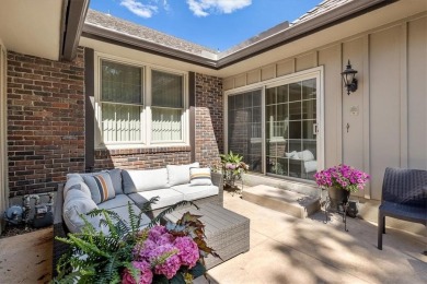 Welcome to this spacious 2-bedroom, 2-bath townhome perfectly on Leawood South Country Club in Kansas - for sale on GolfHomes.com, golf home, golf lot