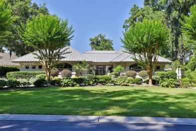 This stunning custom home, set on a premier homesite in the on Colleton River Plantation Club in South Carolina - for sale on GolfHomes.com, golf home, golf lot