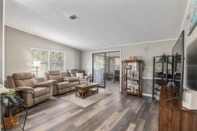 Welcome to this COMPLETELY UPDATED home in Orange Blossom, The on Orange Blossom Hills Golf and Country Club in Florida - for sale on GolfHomes.com, golf home, golf lot