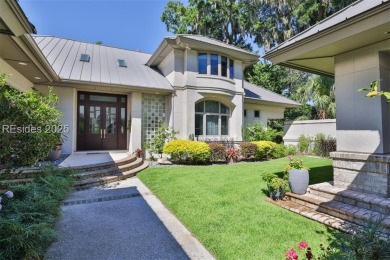 This stunning custom home, set on a premier homesite in the on Colleton River Plantation Club in South Carolina - for sale on GolfHomes.com, golf home, golf lot