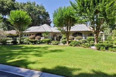 This stunning custom home, set on a premier homesite in the on Colleton River Plantation Club in South Carolina - for sale on GolfHomes.com, golf home, golf lot