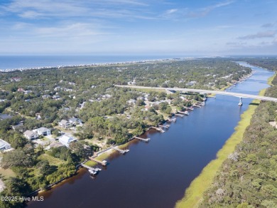 Discover a rare opportunity to own a beautiful wooded homesite on Founders Club At St. James Plantation in North Carolina - for sale on GolfHomes.com, golf home, golf lot