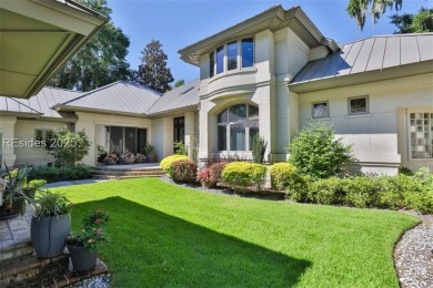 This stunning custom home, set on a premier homesite in the on Colleton River Plantation Club in South Carolina - for sale on GolfHomes.com, golf home, golf lot