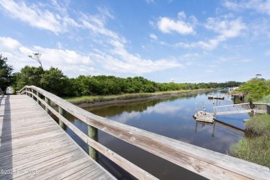 Discover a rare opportunity to own a beautiful wooded homesite on Founders Club At St. James Plantation in North Carolina - for sale on GolfHomes.com, golf home, golf lot