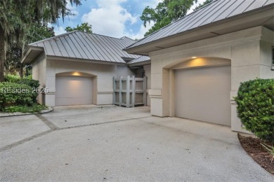 This stunning custom home, set on a premier homesite in the on Colleton River Plantation Club in South Carolina - for sale on GolfHomes.com, golf home, golf lot