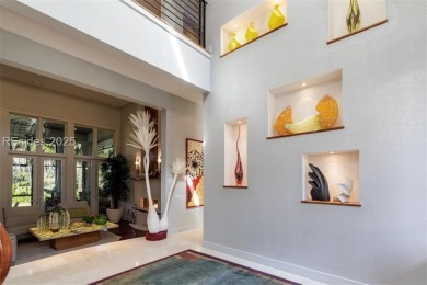 This stunning custom home, set on a premier homesite in the on Colleton River Plantation Club in South Carolina - for sale on GolfHomes.com, golf home, golf lot