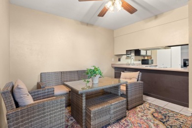 This beautifully maintained townhome offers a perfect blend of on Arroyo Del Oso Golf Course in New Mexico - for sale on GolfHomes.com, golf home, golf lot