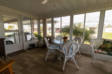 Welcome to this charming 2014 home in the peaceful Whispering on Lily Lake Golf and RV Resort in Florida - for sale on GolfHomes.com, golf home, golf lot