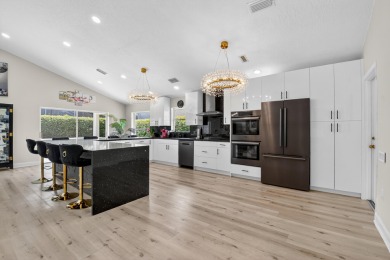 Beautifully renovated 3-bed, 2-bath home at 6060 Pitch Ln on Westchester Golf and Country Club in Florida - for sale on GolfHomes.com, golf home, golf lot