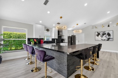 Beautifully renovated 3-bed, 2-bath home at 6060 Pitch Ln on Westchester Golf and Country Club in Florida - for sale on GolfHomes.com, golf home, golf lot