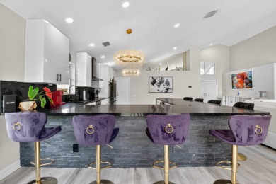 Beautifully renovated 3-bed, 2-bath home at 6060 Pitch Ln on Westchester Golf and Country Club in Florida - for sale on GolfHomes.com, golf home, golf lot