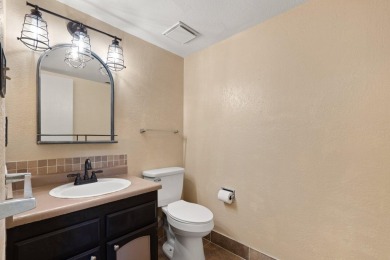 This beautifully maintained townhome offers a perfect blend of on Arroyo Del Oso Golf Course in New Mexico - for sale on GolfHomes.com, golf home, golf lot