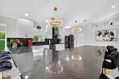 Beautifully renovated 3-bed, 2-bath home at 6060 Pitch Ln on Westchester Golf and Country Club in Florida - for sale on GolfHomes.com, golf home, golf lot