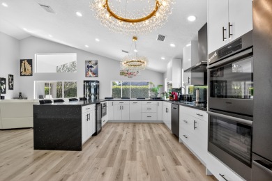 Beautifully renovated 3-bed, 2-bath home at 6060 Pitch Ln on Westchester Golf and Country Club in Florida - for sale on GolfHomes.com, golf home, golf lot