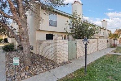 This beautifully maintained townhome offers a perfect blend of on Arroyo Del Oso Golf Course in New Mexico - for sale on GolfHomes.com, golf home, golf lot