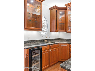 Where the Shallotte River bends and the 17th hole sweeps along on Rivers Edge Golf Club in North Carolina - for sale on GolfHomes.com, golf home, golf lot