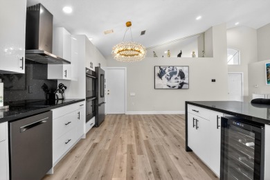 Beautifully renovated 3-bed, 2-bath home at 6060 Pitch Ln on Westchester Golf and Country Club in Florida - for sale on GolfHomes.com, golf home, golf lot