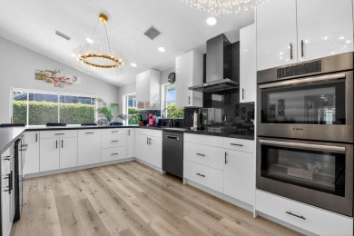 Beautifully renovated 3-bed, 2-bath home at 6060 Pitch Ln on Westchester Golf and Country Club in Florida - for sale on GolfHomes.com, golf home, golf lot