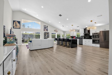 Beautifully renovated 3-bed, 2-bath home at 6060 Pitch Ln on Westchester Golf and Country Club in Florida - for sale on GolfHomes.com, golf home, golf lot