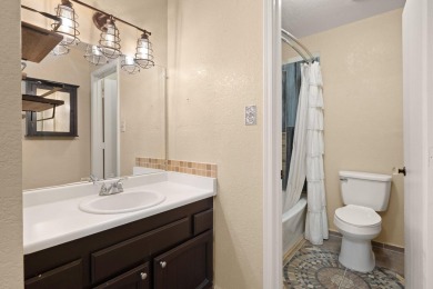 This beautifully maintained townhome offers a perfect blend of on Arroyo Del Oso Golf Course in New Mexico - for sale on GolfHomes.com, golf home, golf lot