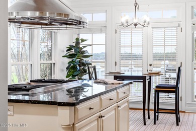 Where the Shallotte River bends and the 17th hole sweeps along on Rivers Edge Golf Club in North Carolina - for sale on GolfHomes.com, golf home, golf lot