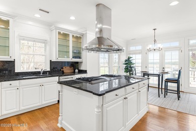 Where the Shallotte River bends and the 17th hole sweeps along on Rivers Edge Golf Club in North Carolina - for sale on GolfHomes.com, golf home, golf lot