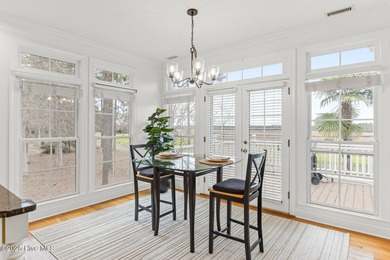 Where the Shallotte River bends and the 17th hole sweeps along on Rivers Edge Golf Club in North Carolina - for sale on GolfHomes.com, golf home, golf lot