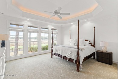 Where the Shallotte River bends and the 17th hole sweeps along on Rivers Edge Golf Club in North Carolina - for sale on GolfHomes.com, golf home, golf lot