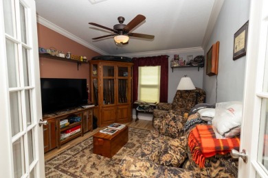 Welcome to this charming 2014 home in the peaceful Whispering on Lily Lake Golf and RV Resort in Florida - for sale on GolfHomes.com, golf home, golf lot