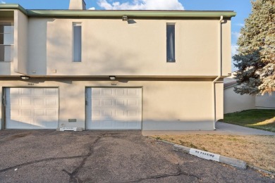 This beautifully maintained townhome offers a perfect blend of on Arroyo Del Oso Golf Course in New Mexico - for sale on GolfHomes.com, golf home, golf lot