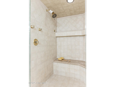 Where the Shallotte River bends and the 17th hole sweeps along on Rivers Edge Golf Club in North Carolina - for sale on GolfHomes.com, golf home, golf lot