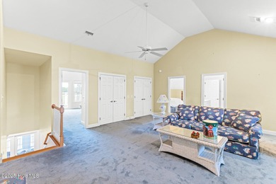 Where the Shallotte River bends and the 17th hole sweeps along on Rivers Edge Golf Club in North Carolina - for sale on GolfHomes.com, golf home, golf lot