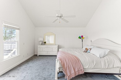 Where the Shallotte River bends and the 17th hole sweeps along on Rivers Edge Golf Club in North Carolina - for sale on GolfHomes.com, golf home, golf lot