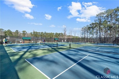 NESTLED IN THE DESIRABLE CARRIAGE RIDGE SECTION OF HARBOR CLUB on Harbor Club Golf and Country Club in Georgia - for sale on GolfHomes.com, golf home, golf lot