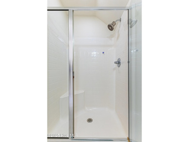 Where the Shallotte River bends and the 17th hole sweeps along on Rivers Edge Golf Club in North Carolina - for sale on GolfHomes.com, golf home, golf lot