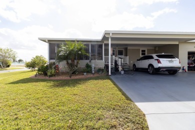 Welcome to this charming 2014 home in the peaceful Whispering on Lily Lake Golf and RV Resort in Florida - for sale on GolfHomes.com, golf home, golf lot