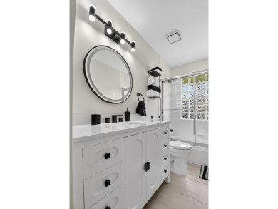 Beautifully renovated 3-bed, 2-bath home at 6060 Pitch Ln on Westchester Golf and Country Club in Florida - for sale on GolfHomes.com, golf home, golf lot