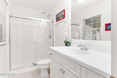 Where the Shallotte River bends and the 17th hole sweeps along on Rivers Edge Golf Club in North Carolina - for sale on GolfHomes.com, golf home, golf lot